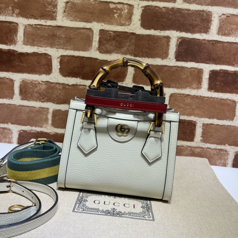G*u*i top handle bags